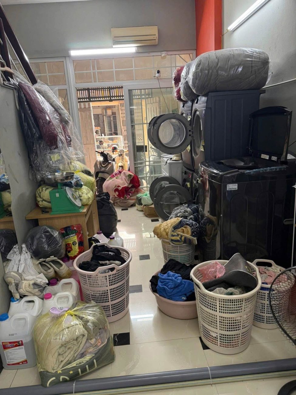 sang nhượng tiệm giặt sấy