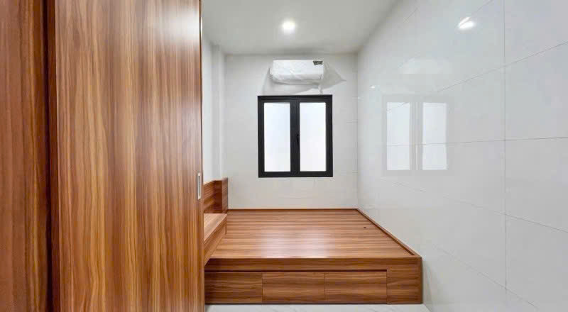 Bán CHDV 4 lầu hẻm 1 sẹc 310 Dương Quảng Hàm ngang 4.5m 86m2 9PN khoán 30tr chỉ 11.5 tỷ. 